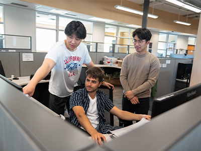 romleft,Raymond Li, third-year Software Engineering, Brandon Pautler, second-year Electrical Engineering, and Justin Yang, first-year Medicine.